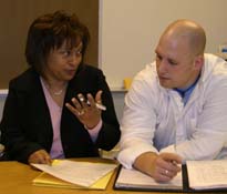 Teacher working with newer teacher